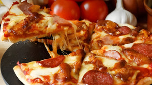 Mouth-watering pizza slice pulled from whole pie, showing cheese stretch, guide to avoiding sogginess.